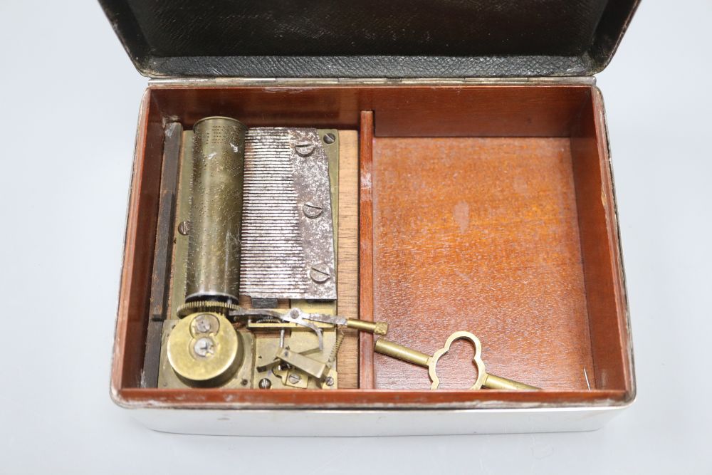 An Edwardian silver musical cigarette box, Birmingham 1907, 15.5cm wide